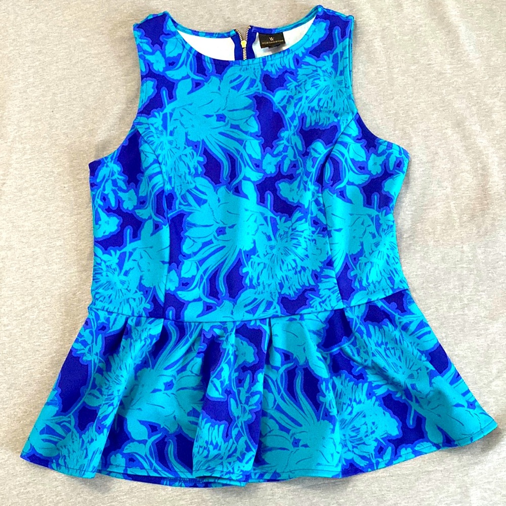Vibrant blue color top with frill detailing at the bottom